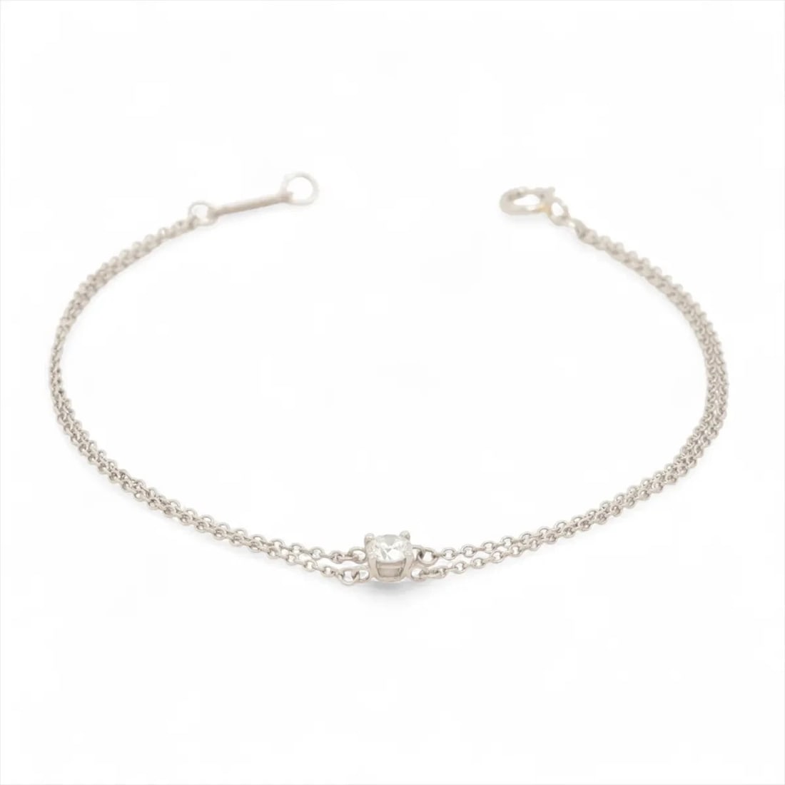 TIFFANY SOLITAIRE DIAMOND BRACELET PT950: Tiffany Solitaire diamond Bracelet Pt950 Brand: Tiffany Type/Style: Bracelet Material: PT950 Color: Silver Size: Bracelet length:16.7cm Accessories: None Accessories Notice: When purchasing pre-owned