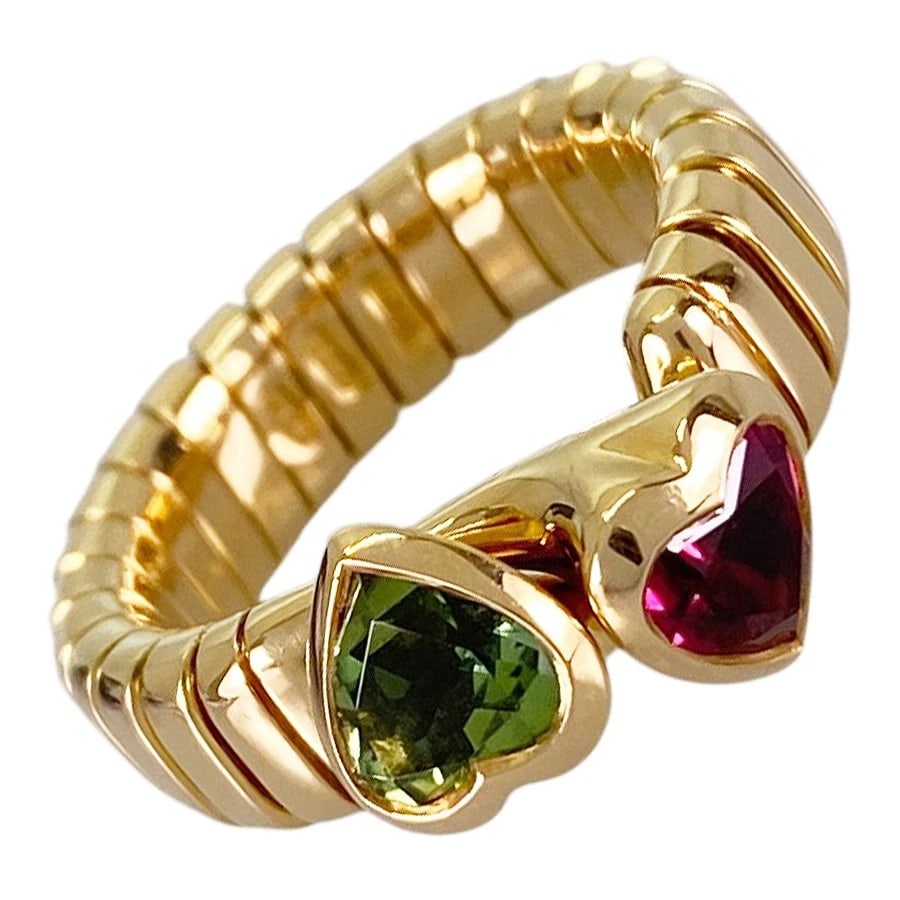 BVLGARI TUBOGAS YELLOW GOLD TOURMALINE PERIDOT RING: BVLGARI Tubogas Yellow gold Tourmaline Peridot Ring Brand: BVLGARI Type/Style: Ring Material: 18K Yellow Gold Main Stone Tourmaline Color: Gold Size: US 5 Accessories: None Accessories Notice: When