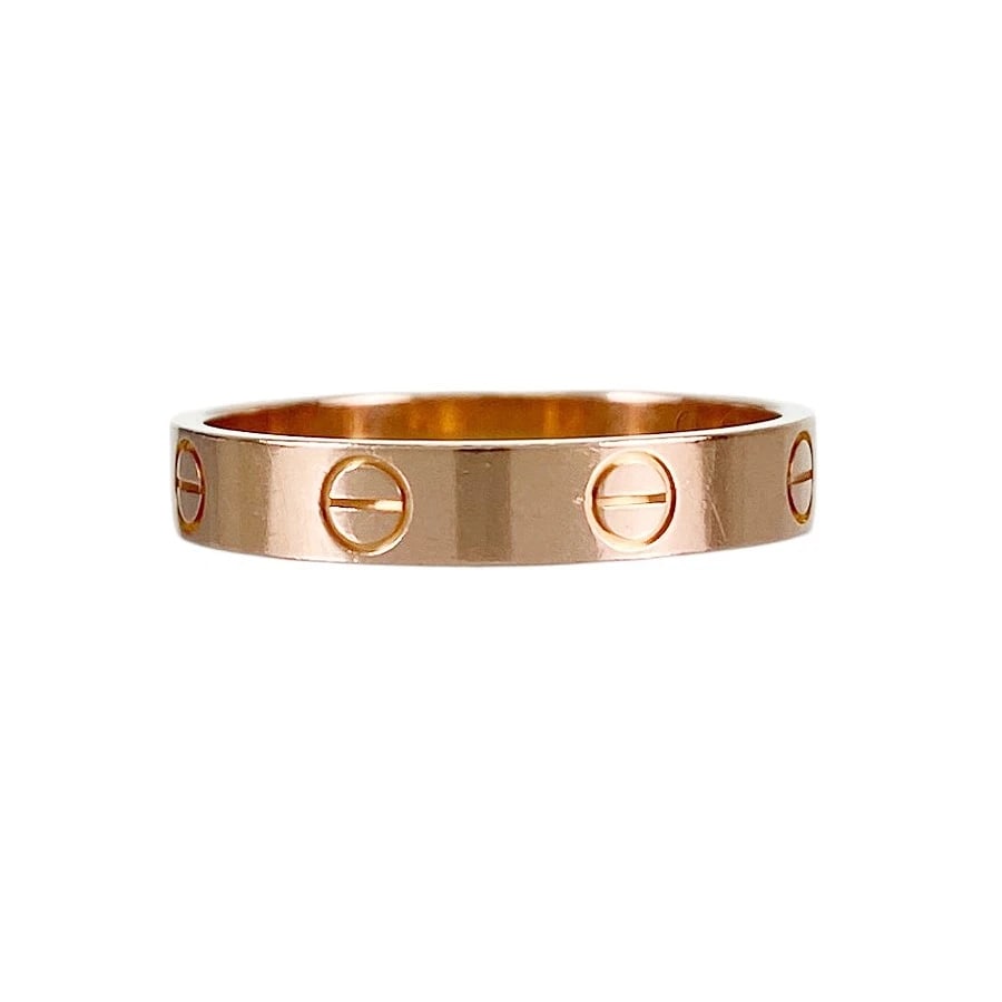 CARTIER MINI LOVE ROSE GOLD RING: Cartier Mini Love Rose gold Ring Brand: Cartier Type/Style: Ring Material: 18K Rose Gold Color: RG Size: US 8 Accessories: None Accessories Notice: When purchasing pre-owned goods, please refer to