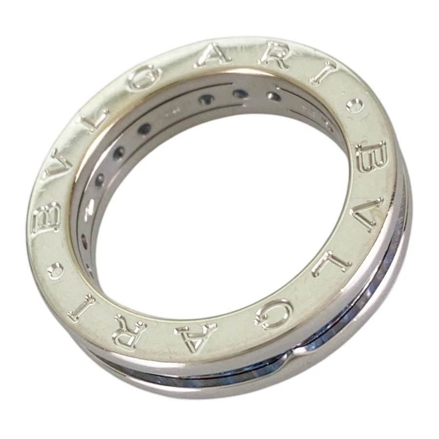 BVLGARI B.ZERO1 BAND WHITE GOLD BLUE TOPAZ RING: BVLGARI B.zero1 band White gold Blue Topaz Ring Brand: BVLGARI Type/Style: Ring Material: 18K White Gold Main Stone Topaz Color: Silver Size: US 6 Accessories: None Accessories Notice: When
