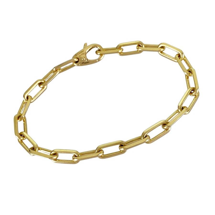 CARTIER SANTOS DE CARTIER MEDIUM YELLOW GOLD BRACELET: Cartier Santos De Cartier Medium Yellow gold Bracelet Brand: Cartier Type/Style: Bracelet Material: 18K Yellow Gold Color: Gold Size: Wrist Size:19cm width:5.6mm Accessories: None Accessories Notice: