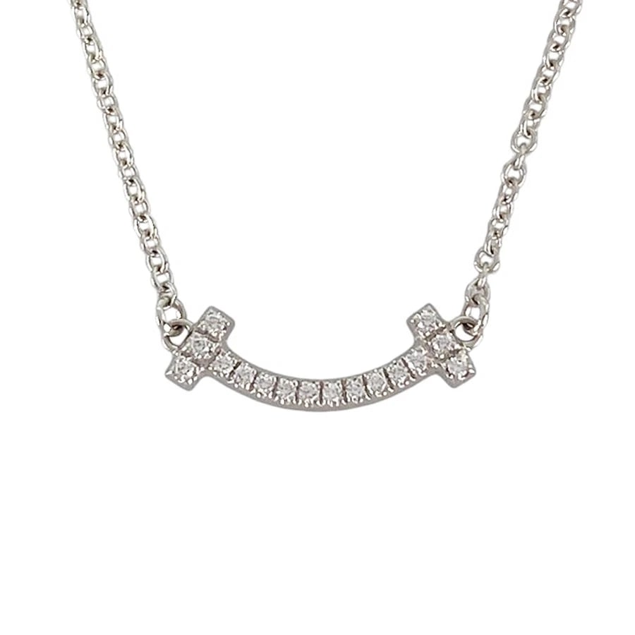 TIFFANY&CO. T SMILE MINI WHITE GOLD DIAMOND NECKLACE: TIFFANY&Co. T Smile mini White gold Diamond Necklace Brand: TIFFANY&Co. Type/Style: Necklace Material: 18K White Gold Color: Silver Size: Top size:6.5mmx12.6mm Necklace full length:45.5cm