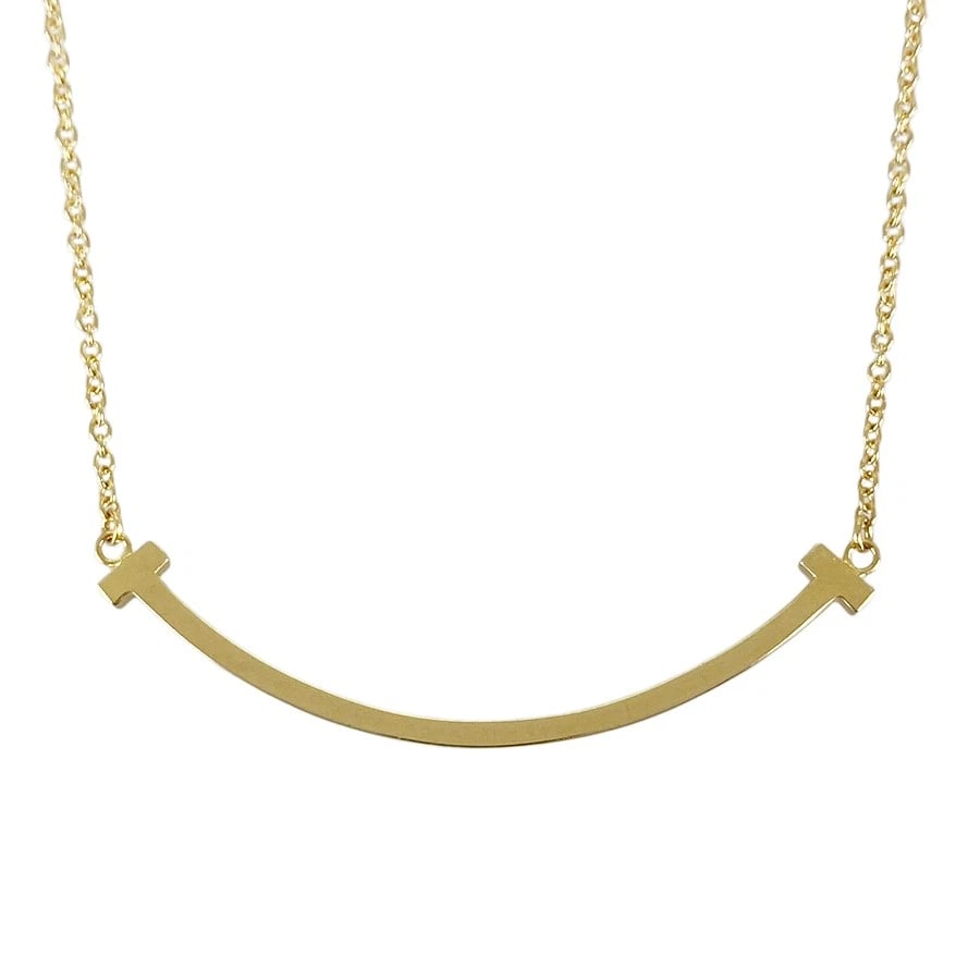 TIFFANY&CO. T SMILE SMALL YELLOW GOLD NECKLACE: TIFFANY&Co. T Smile Small Yellow gold Necklace Brand: TIFFANY&Co. Type/Style: Necklace Material: 18K Yellow Gold Color: Gold Size: Top size:13.2mmx36.6mm Necklace full length:45.5cm Accessories: None