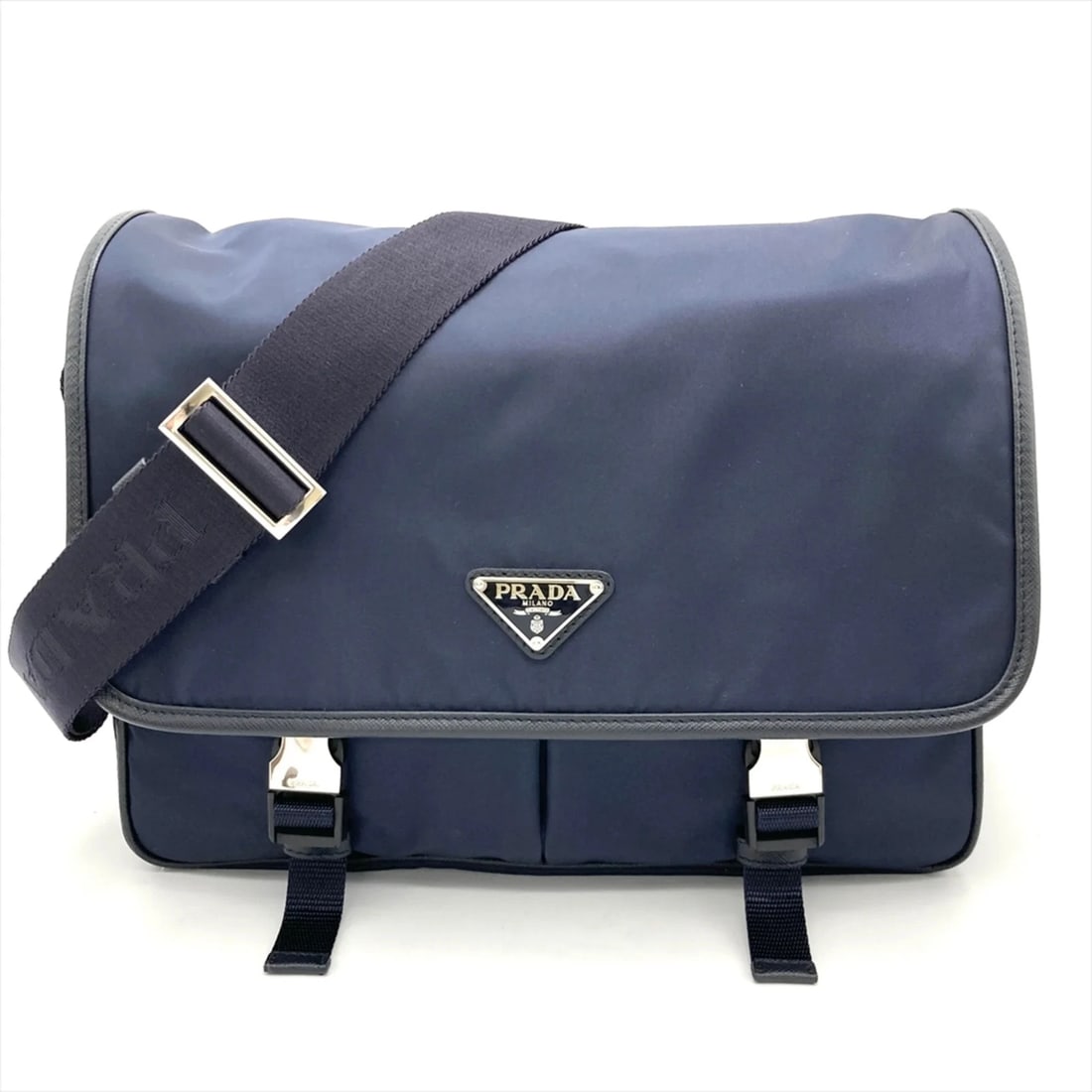 PRADA LOGO HARDWARE SHOULDER BAG NYLON NAVY: Prada Logo Hardware Shoulder Bag Nylon Navy Brand: Prada Type/Style: Shoulder bag Material: Nylon Color: Navy Size: (HxWxD) 25cm x 31cm x 12cm / 9.84inch x 12.2inch x 4.72inch Accessories: None