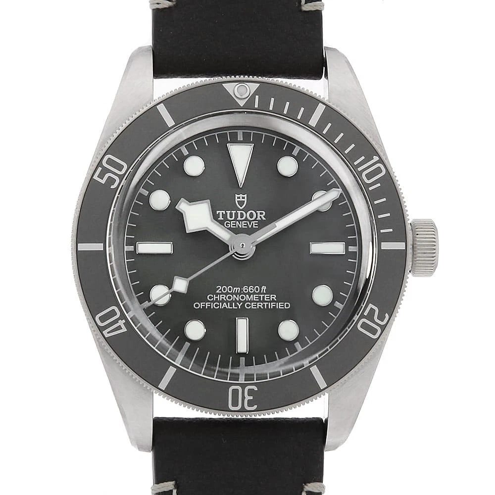TUDOR BLACK CALFSKIN WATCH: TUDOR Black Calfskin Watch Brand: TUDOR Type/Style: Wrist watch Material: Band Material Calfskin, Case Material Silver Color: Dial colour Gray Size: Case:W39mm Accessories: None Accessories Notice: