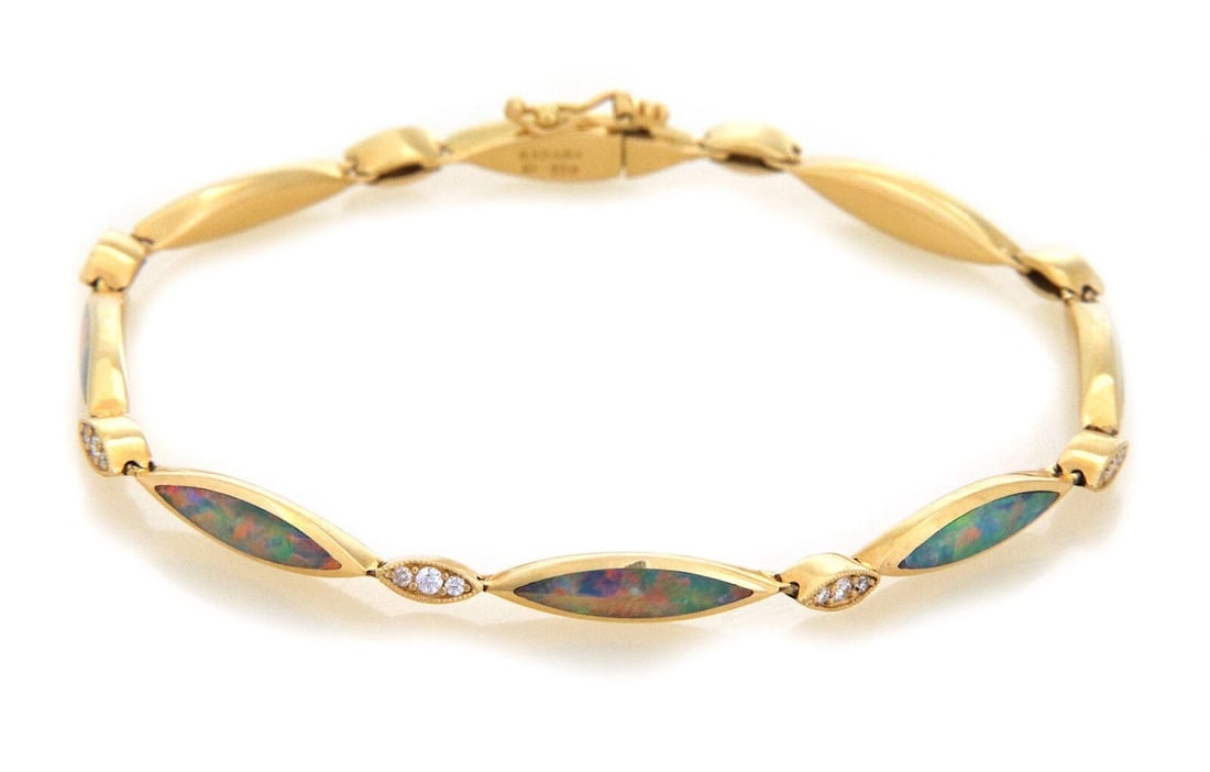 KABANA FIRE OPAL DIAMOND 18K YELLOW GOLD BRACELET: Kabana Fire Opal Diamond 18k Yellow Gold Bracelet Brand: Kabana Type/Style: Bracelet Material: 18k yellow gold Main Stone Natural Color: Yellow Size: Bracelet Length: Approximately 7.5inch
