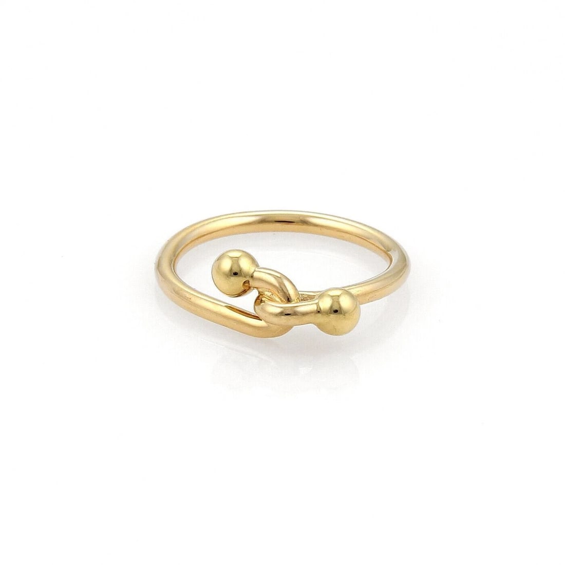 TIFFANY & CO. 18K YELLOW GOLD DOUBLE HOOK BAND RING: Tiffany & Co. 18k Yellow Gold Double Hook Band Ring Brand: Tiffany & Co. Type/Style: Ring Material: 18k yellow gold Color: yellow Size: 5 US Accessories: None Accessories Notice: When purc