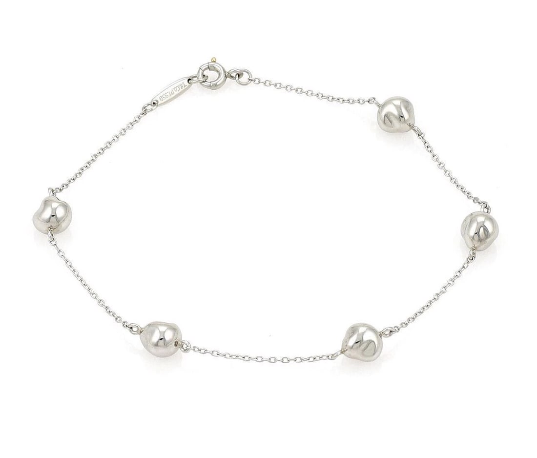 TIFFANY & CO. ELSA PERETTI 5 NUGGET PLATINUM BRACELET: Tiffany & Co. Elsa Peretti 5 Nugget Platinum Bracelet Brand: Tiffany & Co. Type/Style: Bracelet Material: Platinum Color: Platinum Size: Bracelet Length: Approximately 7.75inch Accessories: None <