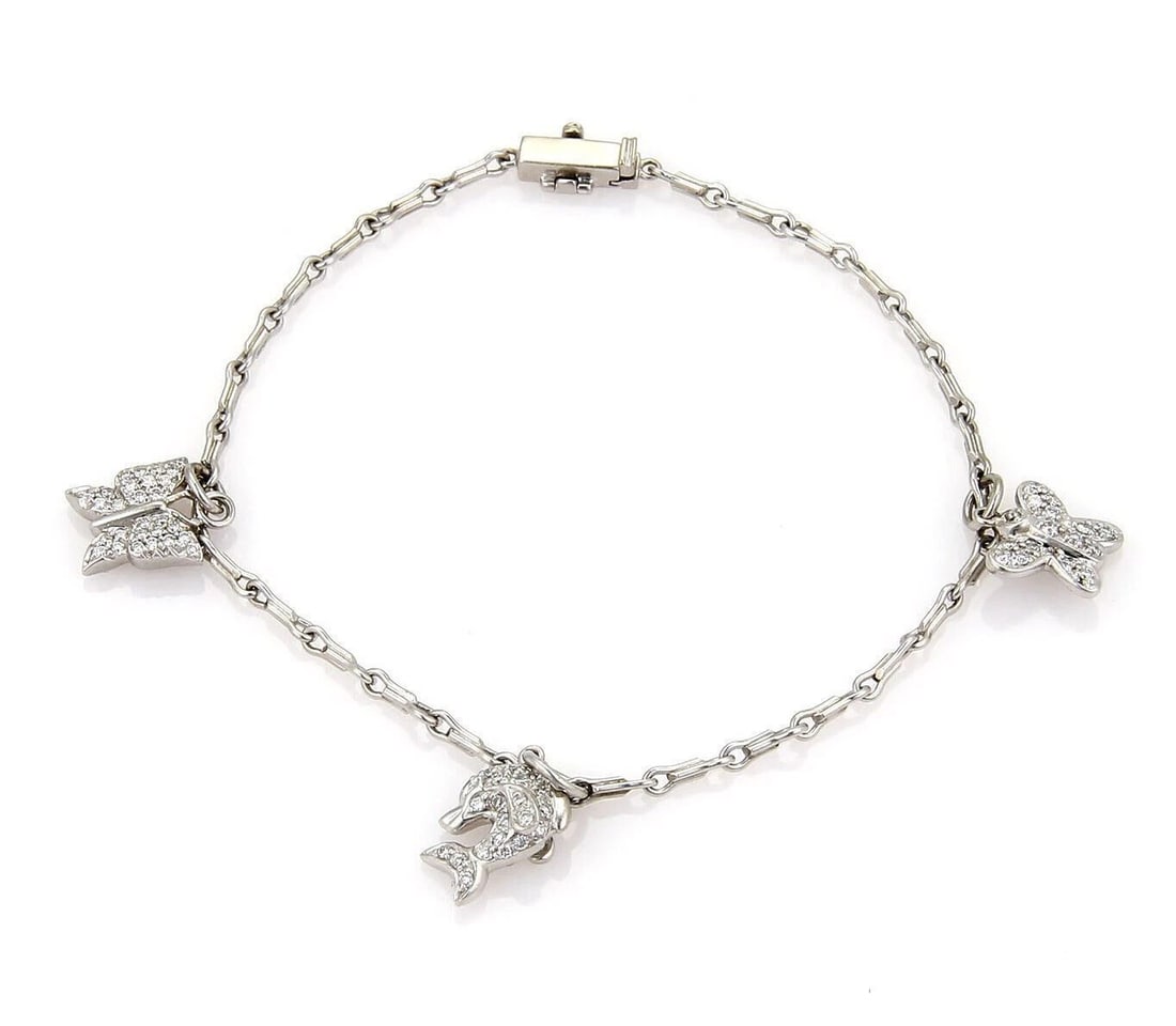 DIAMOND TRIPLE CHARM PLATINUM CHAIN LINK BRACELET: Diamond Triple Charm Platinum Chain Link Bracelet Brand: Unbranded Type/Style: Bracelet Material: PT950 Color: Platinum Size: Bracelet Length: Approximately 7inch Charm Measurements: Range from