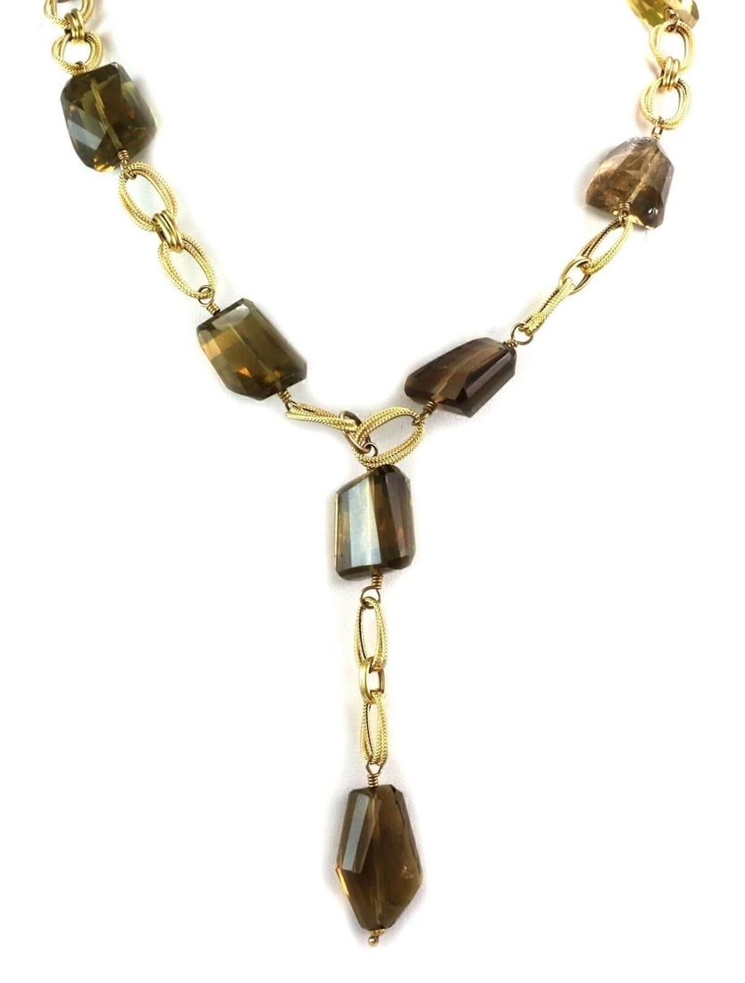 SMOKY QUARTZ FANCY OVAL 14K YELLOW GOLD NECKLACE: Smoky Quartz Fancy Oval 14k Yellow Gold Necklace Brand: Unbranded Type/Style: Necklace Material: Solid 14k yellow gold Color: yellow and white Size: Chain Measurements: Approximately 16.5inch long x 8