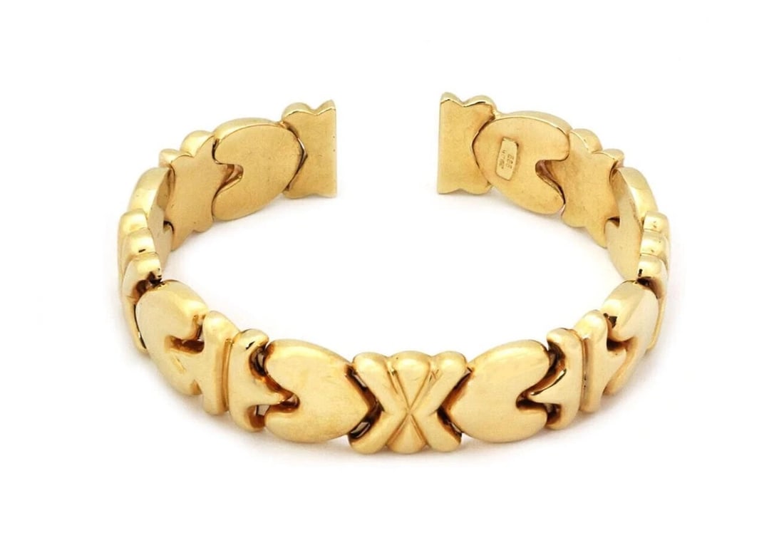 HEARTS X DESIGN 13MM FLEX 14K YELLOW GOLD CUFF BRACELET: Hearts X Design 13mm Flex 14k Yellow Gold Cuff Bracelet Brand: Unbranded Type/Style: Bracelet Material: 14k yellow gold Color: yellow Size: Measurements: Approximately 6.5inch with opening x 0.50inch