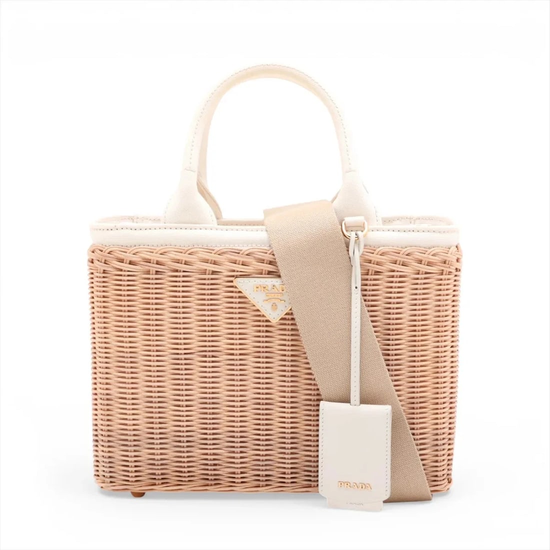 PRADA CANAPA WICKER RATTAN X CANVAS 2 WAY HANDBAG: Prada Canapa wicker rattan x canvas 2 Way Handbag Brand: Prada Type/Style: Top Handle Bag Material: rattan x canvas Color: Beige Size: Height:7.7inchLength:10.0inchDepth:4.5inch Accessories: None