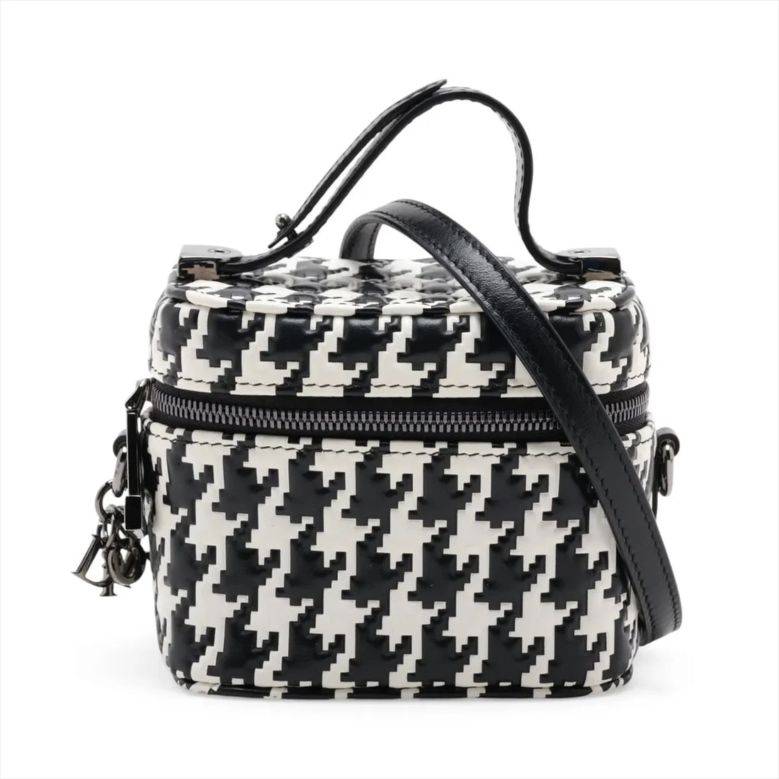 CHRISTIAN DIOR MICRO LEATHER 2 WAY VANITY BAG: Christian Dior Micro Leather 2 WAY VANITY BAG Brand: Christian Dior Type/Style: Top Handle Bag Material: Leather Color: Black ? White Size: Height:3.7inchLength:4.3inchDepth:2.8inch Accessories: None