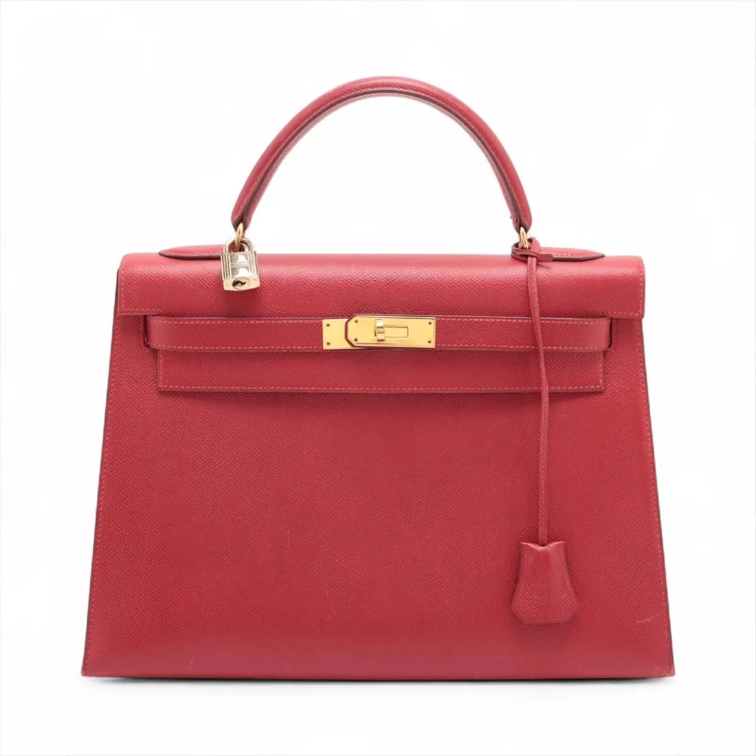 HERMES KELLY 32 SERIE CUSHBELL ROUGE VIF GOLD METAL: Hermes Kelly 32 Serie Cushbell Rouge vif Gold Metal Brand: Hermes Type/Style: Top Handle Bag Material: Cushbell Color: Rouge vif Size: Height:8.9inchLength:12.8inchDepth:4.5inch Accessories: None