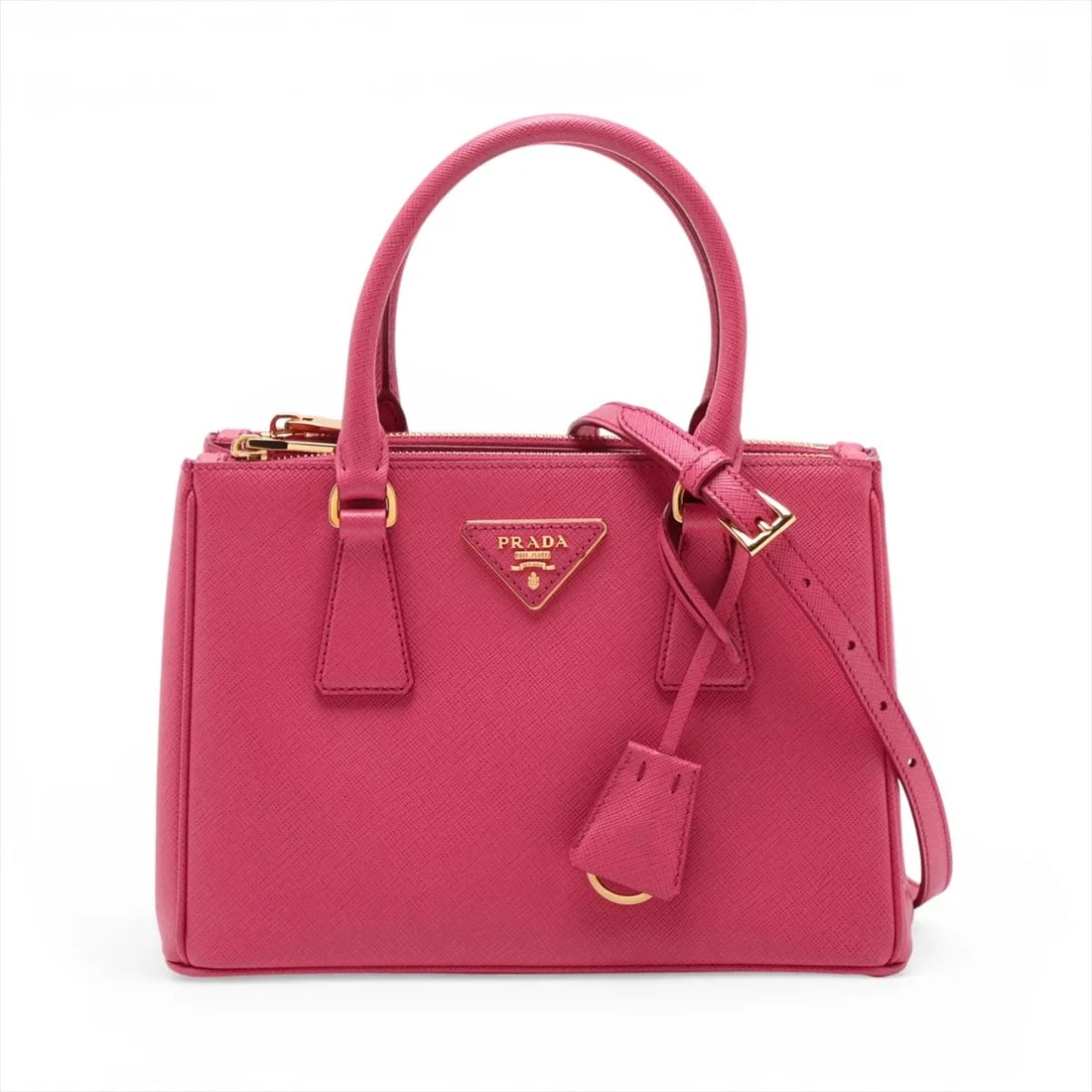 PRADA SAFFIANO HANDBAG: Prada Saffiano Handbag Brand: Prada Type/Style: Top Handle Bag Material: Leather Color: Pink Size: Height:6.7inchLength:9.8inchDepth:4.5inch Accessories: None Accessories Notice: When purchasing