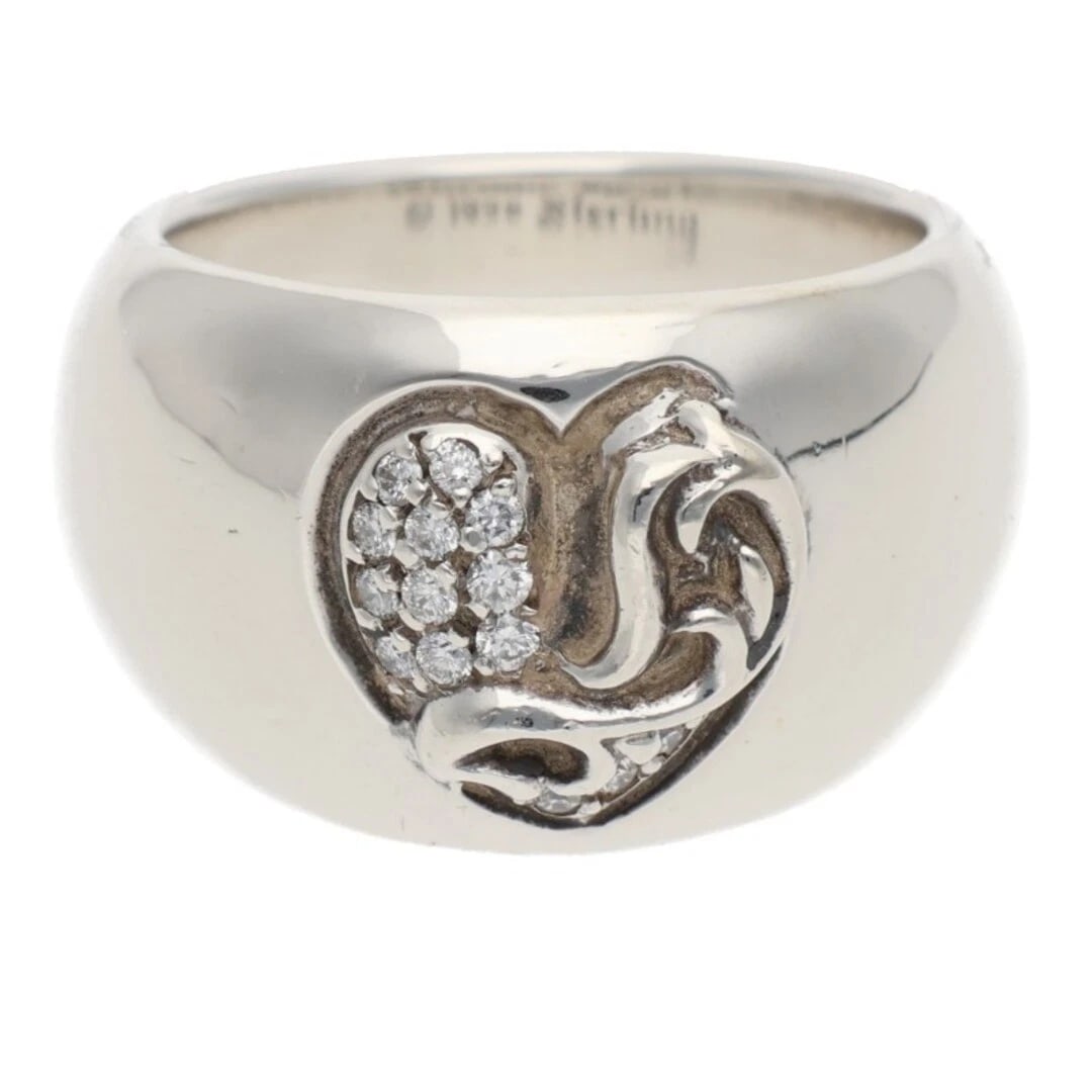 CHROME HEARTS HEART IN BAND P DMND PAVE DIAMOND RING: Chrome Hearts Heart in Band P DMND Pave Diamond Ring Brand: Chrome Hearts Type/Style: Ring Material: 925 Silver Color: silver Size: 6.75 - 7 US Accessories: None Accessories Notice: When p