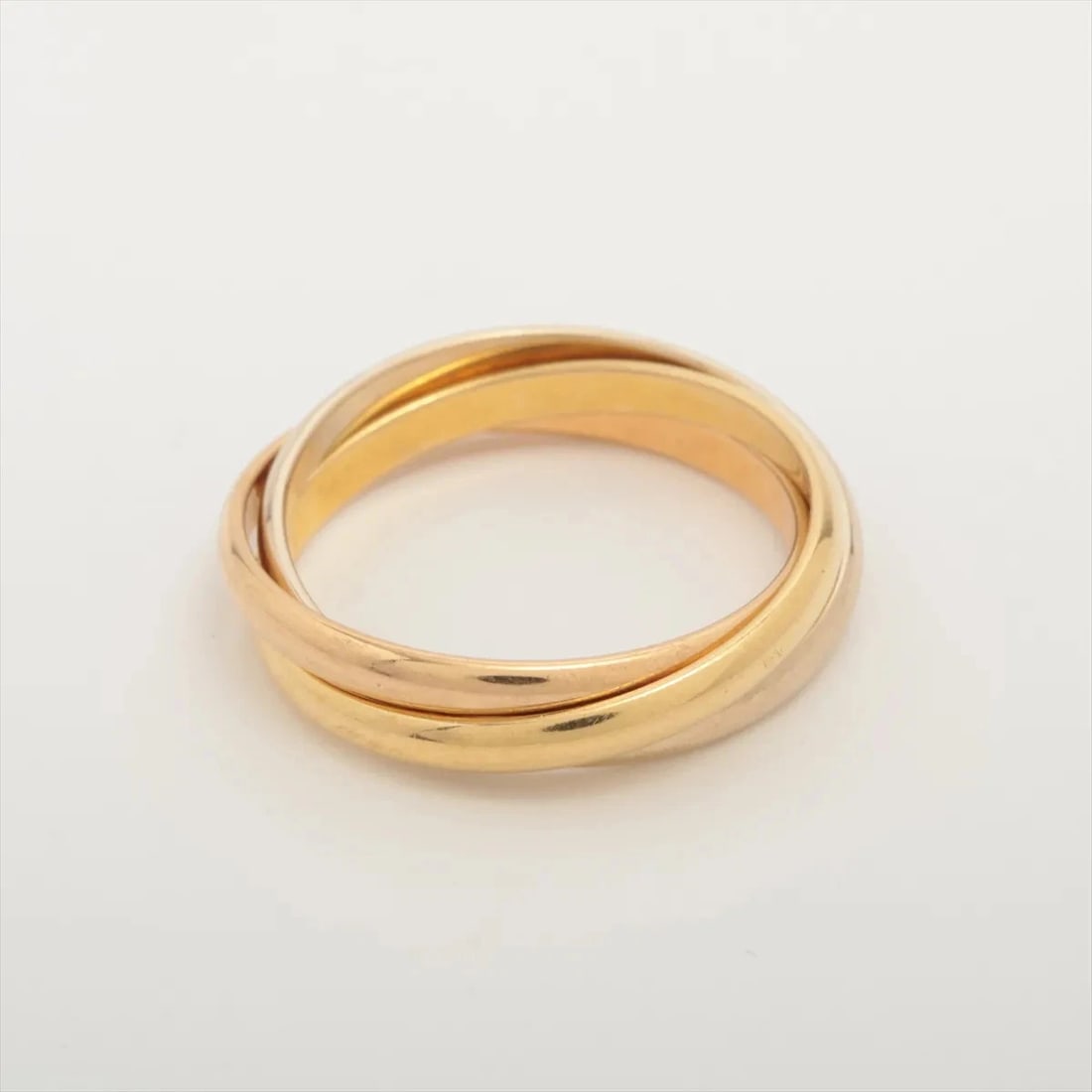CARTIER TRINITY RING 750(YG?PG?WG): Cartier Trinity Ring 750(YG?PG?WG) Brand: Cartier Type/Style: Ring Material: 750(YG?PG?WG) Color: YG?PG?WG Size: 4.5 - 4.75 US Accessories: None Accessories Notice: When purchasing pre-own