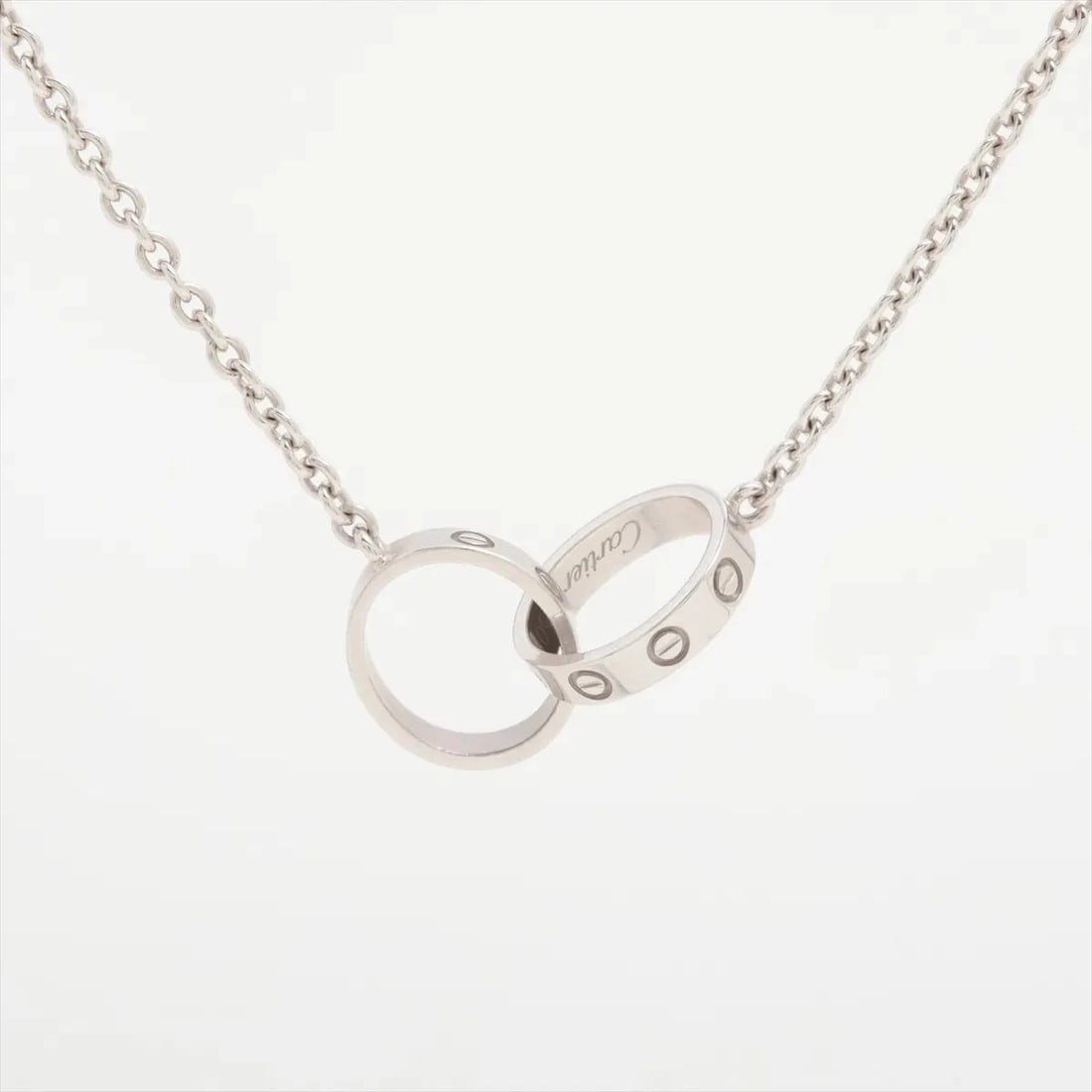 CARTIER BABY LOVE NECKLACE 750(WG): Cartier Baby Love Necklace 750(WG) Brand: Cartier Type/Style: Necklace Material: 750(WG) Color: White Gold Size: Chain length:44.7cm Accessories: None Accessories Notice: When purchasing pre-owned