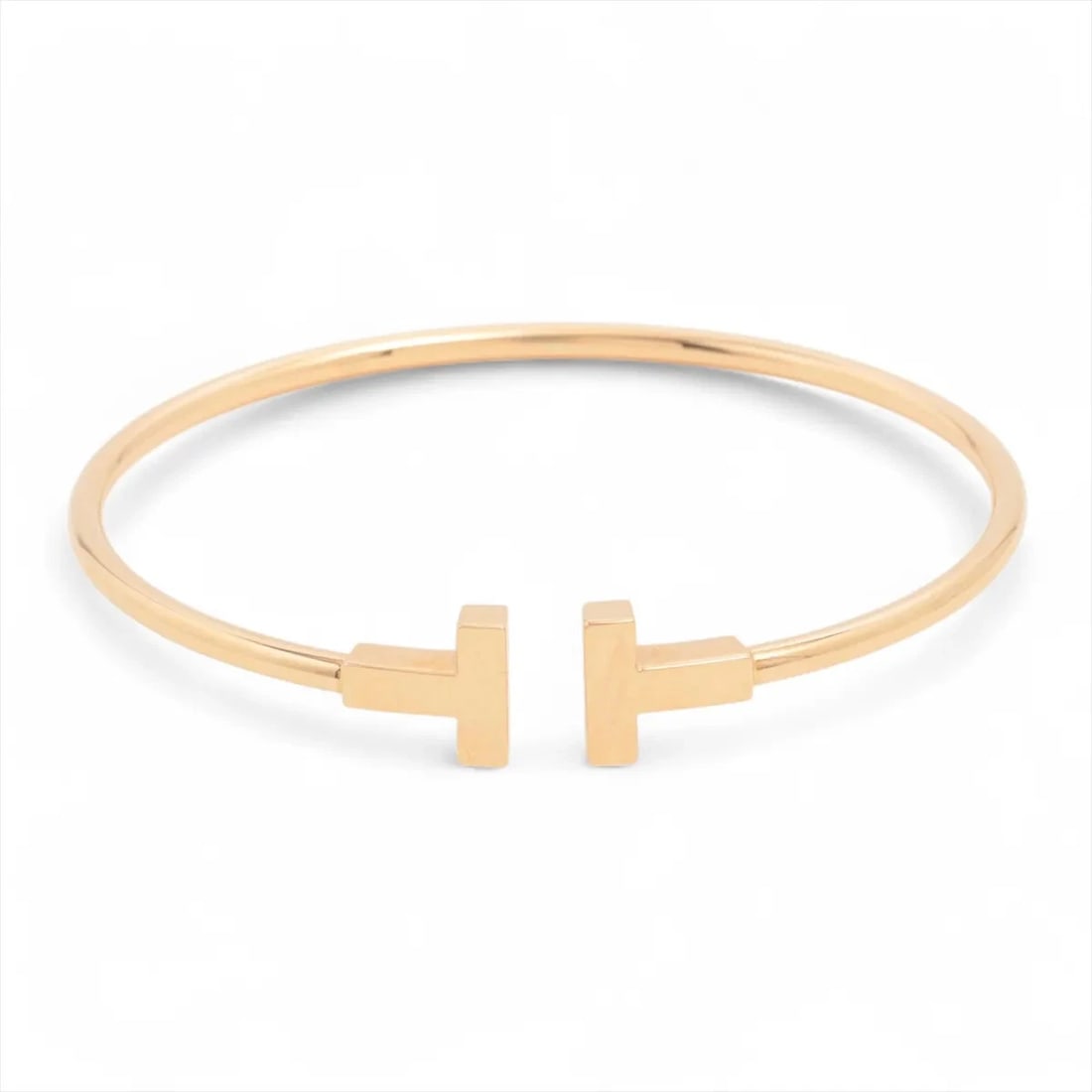TIFFANY T WIRE BRACELET 750(PG): Tiffany T Wire Bracelet 750(PG) Brand: Tiffany Type/Style: Bracelet Material: 750(PG) Color: Pink Gold Size: Bracelet length:16.2cm Accessories: None Accessories Notice: When purchasing pre-owned