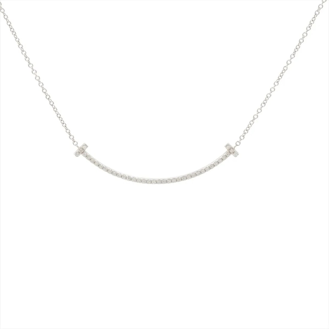 TIFFANY T SMILE SMALL DIAMOND NECKLACE 750(WG): Tiffany T Smile Small diamond Necklace 750(WG) Brand: Tiffany Type/Style: Necklace Material: 750(WG) Color: White Gold Size: Chain length:41.2cm Accessories: None Accessories Notice: When purchasing