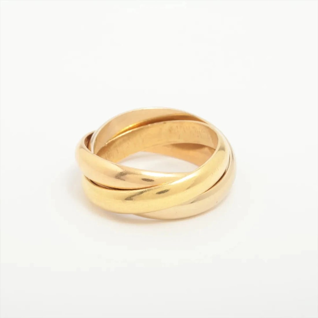 CARTIER TRINITY RING 750(YG?PG?WG): Cartier Trinity Ring 750(YG?PG?WG) Brand: Cartier Type/Style: Ring Material: 750(YG?PG?WG) Color: YG?PG?WG Size: 7.5 US Accessories: None Accessories Notice: When purchasing pre-owned good
