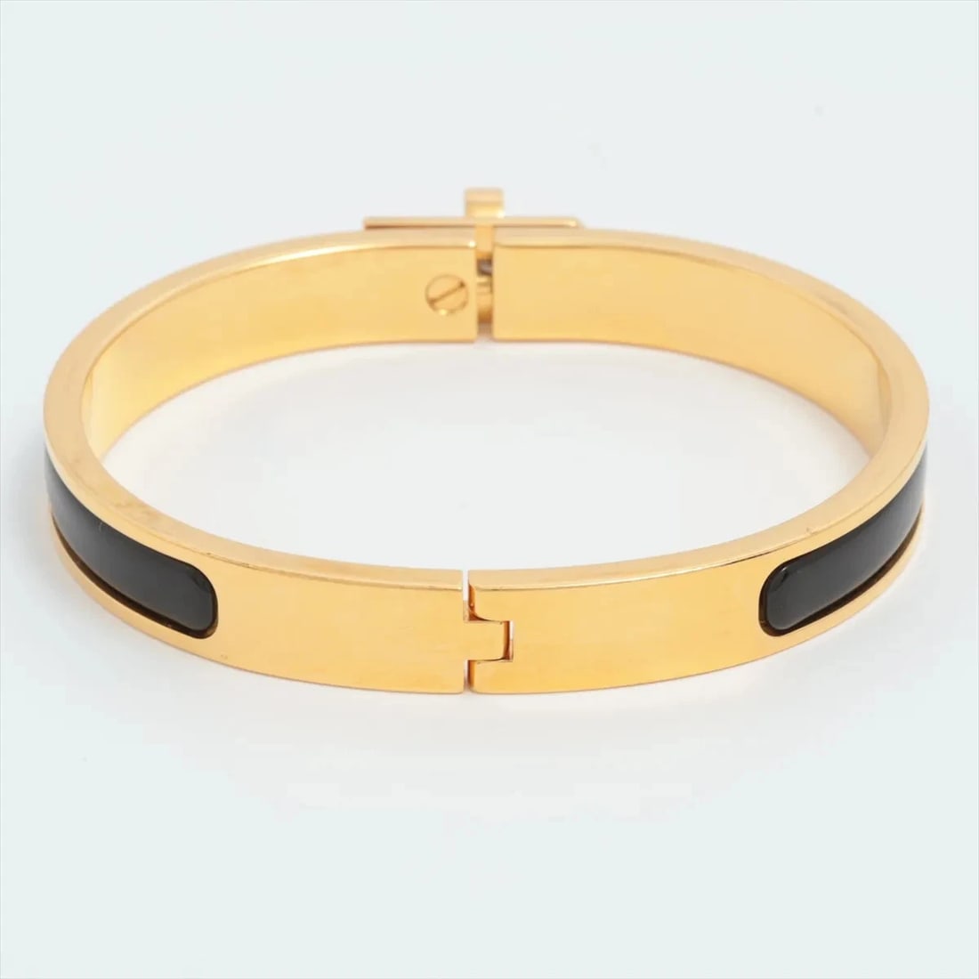 HERMES MINICLICK KELLY BRACELET GP ENAMEL BLACK GOLD: Hermes Miniclick Kelly Bracelet GP Enamel Black Gold Brand: Hermes Type/Style: Bracelet Material: GP Enamel Color: Black Gold Size: Bracelet length:15cm Accessories: None Accessories Notic