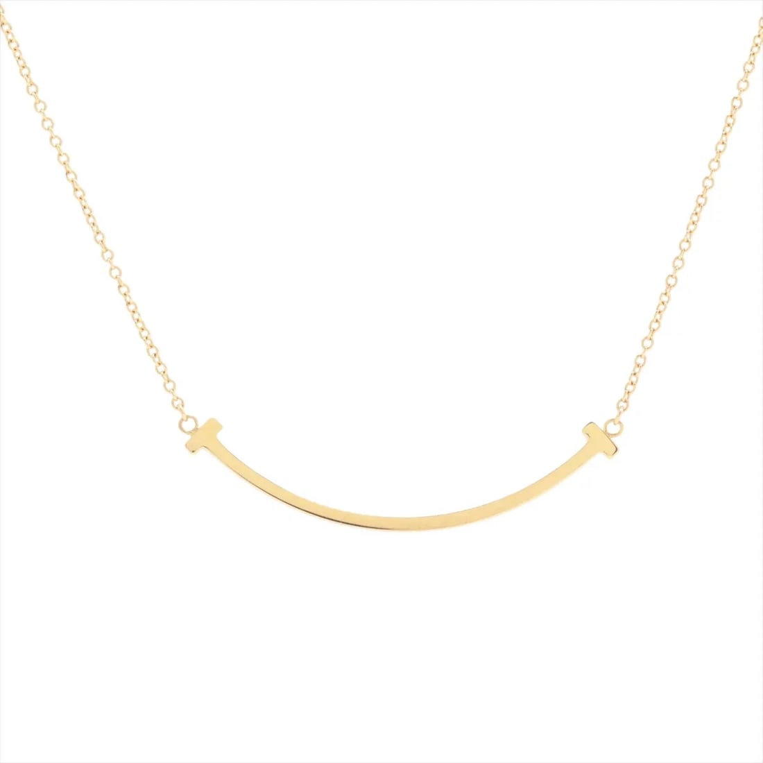 TIFFANY T SMILE SMALL NECKLACE 750(YG): Tiffany T Smile Small Necklace 750(YG) Brand: Tiffany Type/Style: Necklace Material: 750(YG) Color: yellow Gold Size: Chain length:46cm Accessories: None Accessories Notice: When purchasing pre-owned