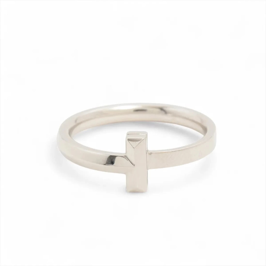 TIFFANY T-ONE NARROW RING 750(WG): Tiffany T-One Narrow Ring 750(WG) Brand: Tiffany Type/Style: Ring Material: 750(WG) Color: White Gold Size: 6 - 6.25 US Accessories: None Accessories Notice: When purchasing pre-owned goods, please