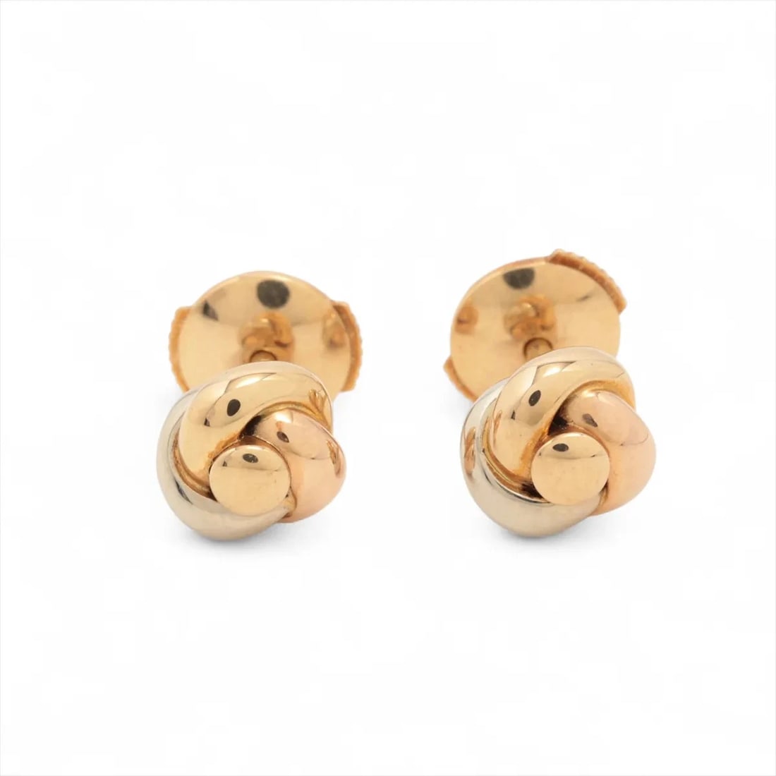 CARTIER BABY TRINITY PIERCING JEWELRY 750(YG?PG?WG): Cartier Baby Trinity Piercing jewelry 750(YG?PG?WG) Brand: Cartier Type/Style: Piercing jewelry Material: 750(YG?PG?WG) Color: YG?PG?WG Size: Height:0.6 Length:0.6cm Accessories: None Accessories