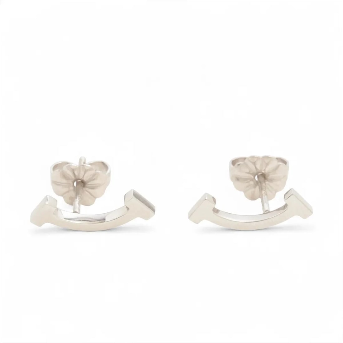 TIFFANY T SMILE PIERCING JEWELRY 750(WG): Tiffany T Smile Piercing jewelry 750(WG) Brand: Tiffany Type/Style: Piercing jewelry Material: 750(WG) Color: White Gold Size: Height:0.5Length:1.4cm Accessories: None Accessories Notice: When