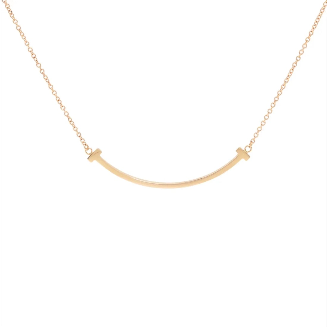 TIFFANY T SMILE SMALL NECKLACE 750(PG): Tiffany T Smile Small Necklace 750(PG) Brand: Tiffany Type/Style: Necklace Material: 750(PG) Color: Pink Gold Size: Chain length:46cm Accessories: None Accessories Notice: When purchasing