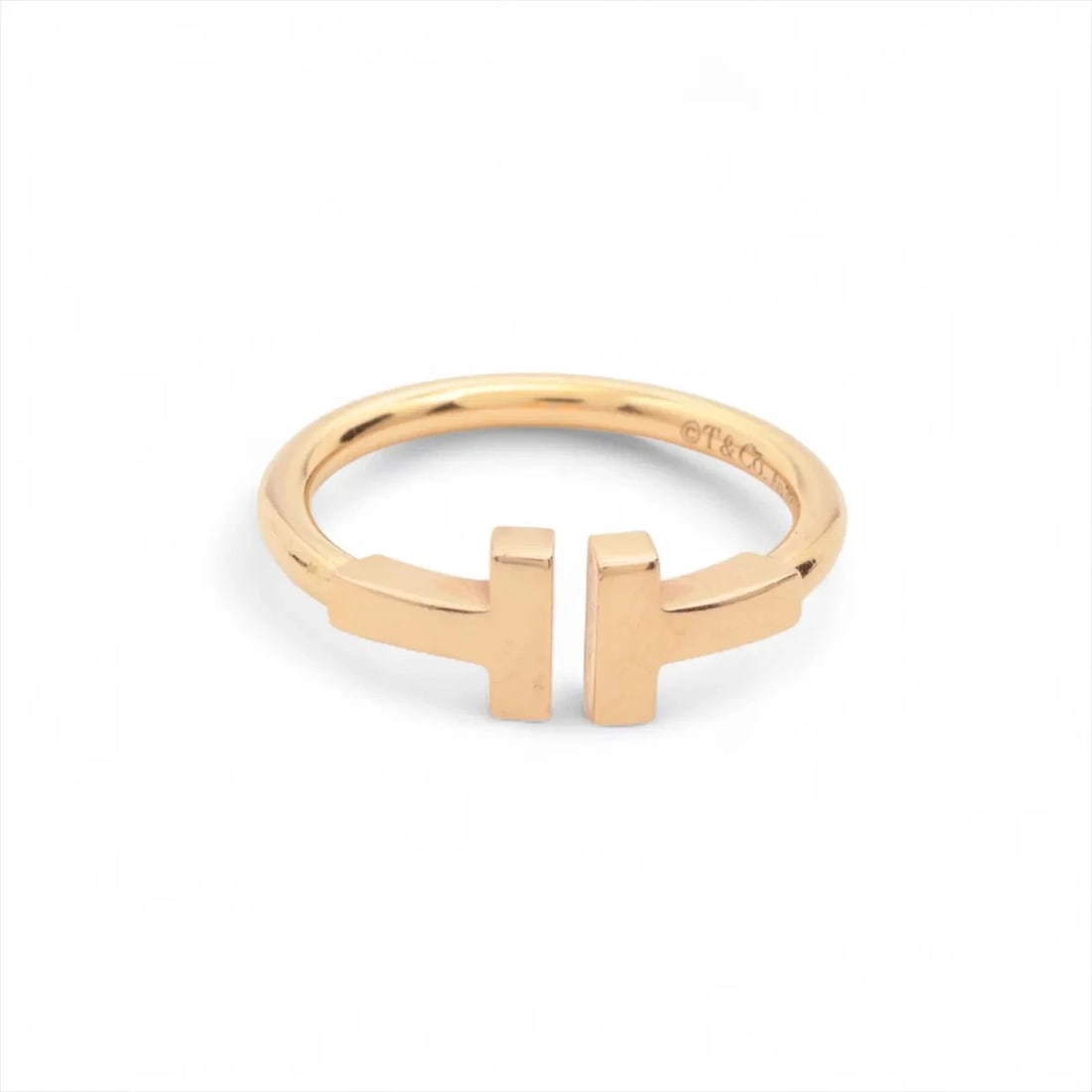 TIFFANY T WIRE RING 750(PG): Tiffany T Wire Ring 750(PG) Brand: Tiffany Type/Style: Ring Material: 750(PG) Color: PG Size: 4 US Accessories: None Accessories Notice: When purchasing pre-owned goods, please refer to th