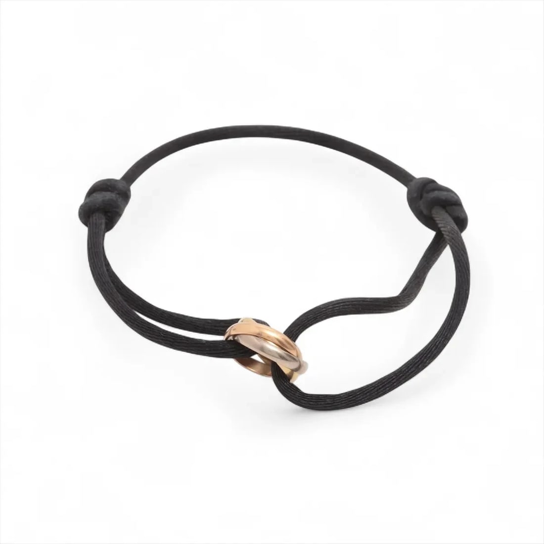CARTIER TRINITY CORD BRACELET 750(YG?PG?WG): Cartier Trinity Cord bracelet 750(YG?PG?WG) Brand: Cartier Type/Style: Bracelet Material: 750(YG?PG?WG) Color: YG?PG?WG Size: Bracelet length:18.2cm Accessories: None Accessories Notice: When