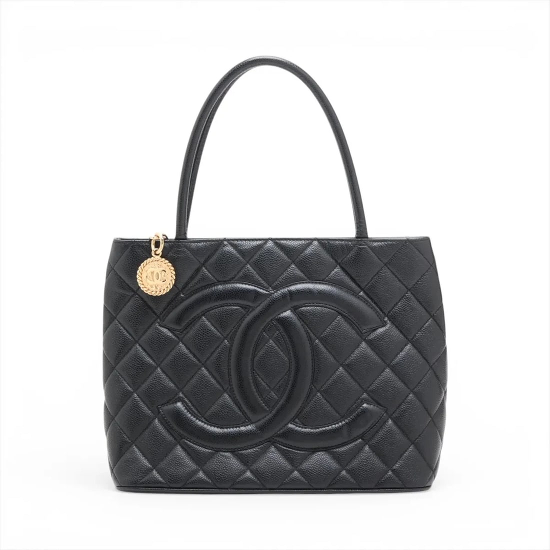 CHANEL RE-RELEASE CAVIAR SKIN TOTE BAG: Chanel Re-release Caviar Skin Tote bag Brand: Chanel Type/Style: Tote Material: Caviar Skin Color: Black Size: Height:9.3inchLength:11.8inchDepth:5.9inch Accessories: None Accessories Noti