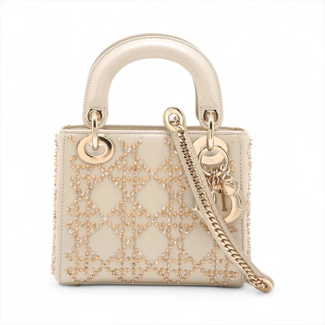 CHRISTIAN DIOR LADY DIOR MINI LEATHER X BEADS 2 WAY HANDBAG: Christian Dior Lady Dior Mini Leather x beads 2 Way Handbag Brand: Christian Dior Type/Style: Top Handle Bag Material: Leather x beads Color: Beige Size: Height:5.5inchLength:6.5inchDepth:3.0inch