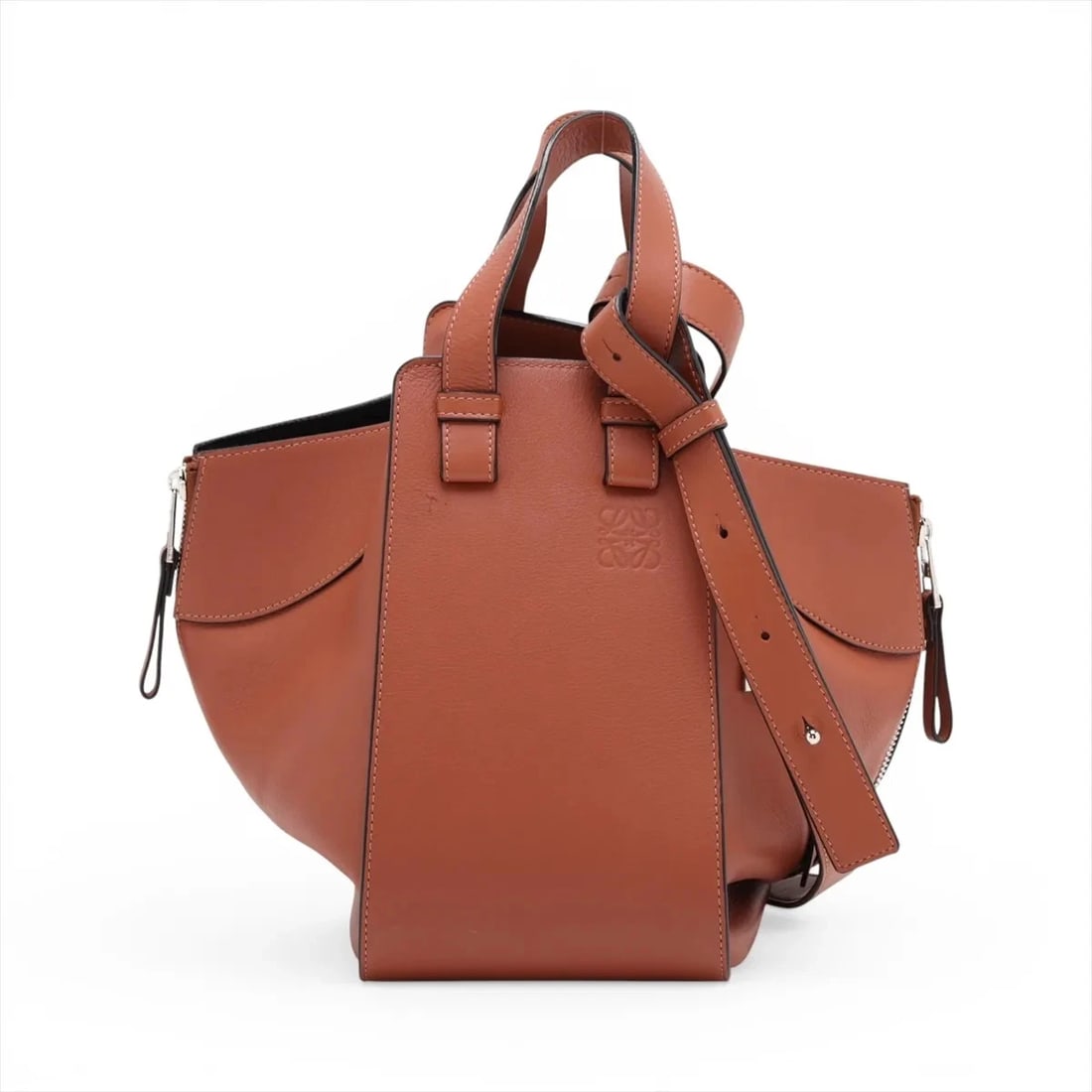 LOEWE HAMMOCK SMALL LEATHER 2 WAY HANDBAG: Loewe Hammock Small Leather 2 Way Handbag Brand: Loewe Type/Style: Top Handle Bag Material: Leather Color: Brown Size: Height:9.3inchLength:5.3inchDepth:11.6inch Accessories: None Accessor