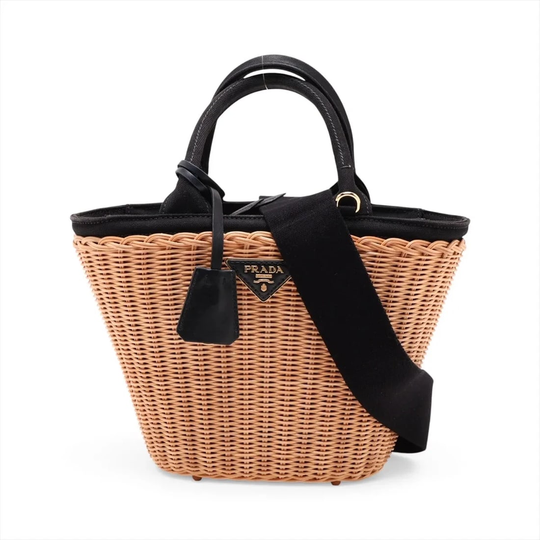 PRADA CANAPA RATTAN X CANVAS 2 WAY HANDBAG: Prada Canapa rattan x canvas 2 Way Handbag Brand: Prada Type/Style: Top Handle Bag Material: rattan x canvas Color: Beige x black Size: Height:8.1inchLength:7.1inchDepth:4.7inch Accessories: None