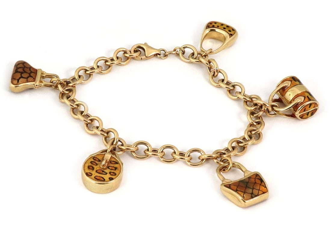 HANDBAG CHARM ENAMEL 14K YELLOW GOLD BRACELET: Handbag Charm Enamel 14k Yellow Gold Bracelet Brand: Unbranded Type/Style: Bracelet Material: 14k yellow gold Color: Yellow Size: Length: Approximately 7.25inch Charm Sizes: Range from approximately 1