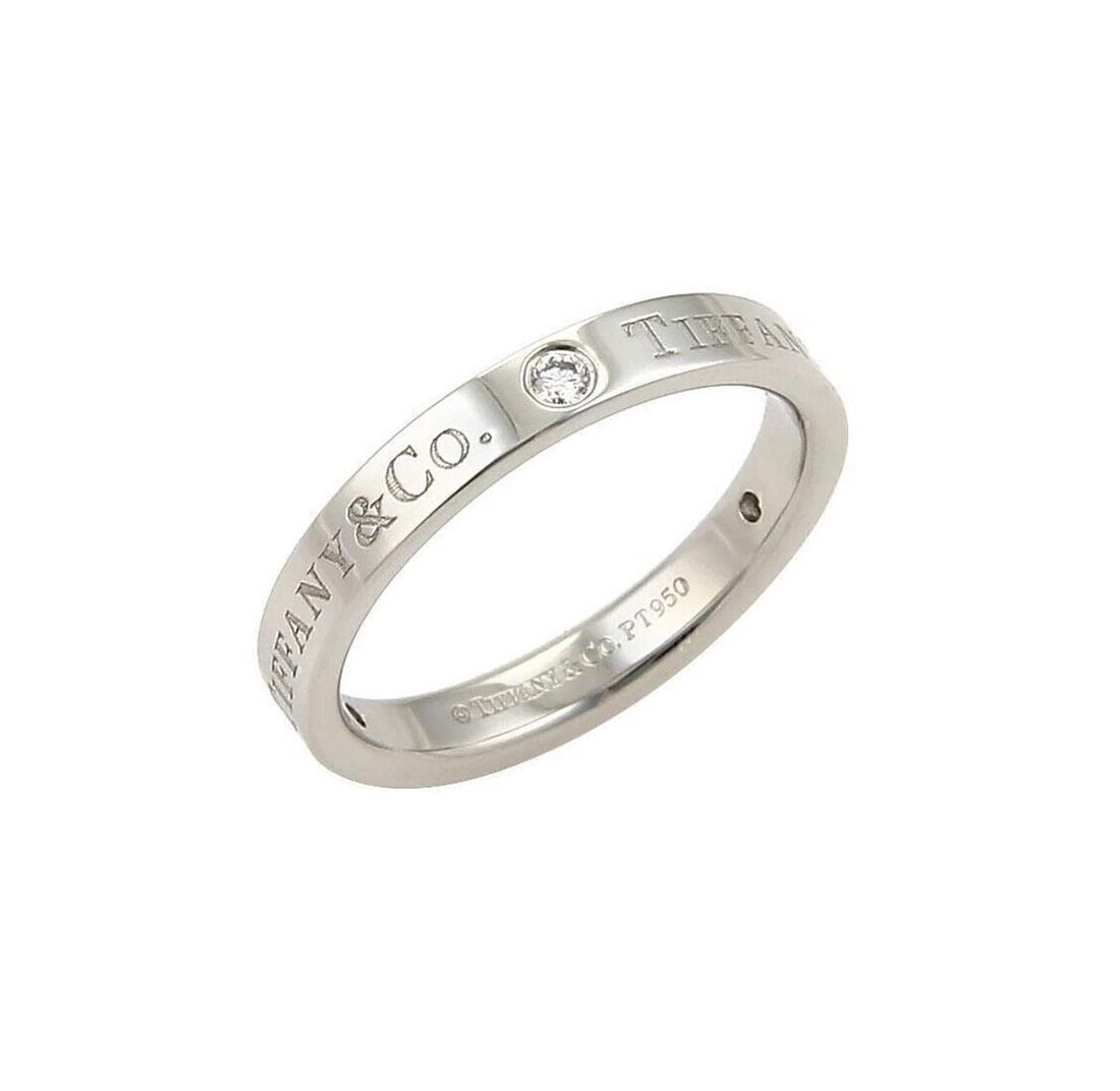 TIFFANY & CO. 3 DIAMOND PLATINUM FLAT BAND RING: Tiffany & Co. 3 Diamond Platinum Flat Band Ring Brand: Tiffany & Co. Type/Style: Ring Material: PT950 Main Stone Natural Color: silver Size: 6 US Accessories: None Accessories Notice: When