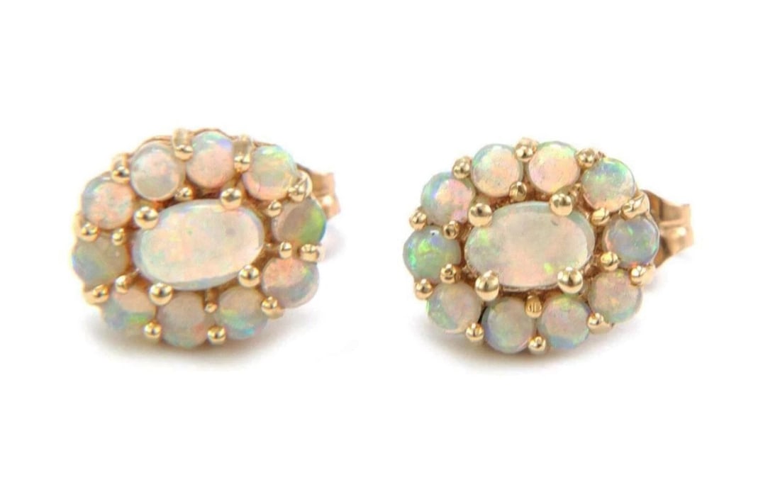 FIRE OPAL 14K YELLOW GOLD OVAL HALO STUD EARRINGS: Fire Opal 14k Yellow Gold Oval Halo Stud Earrings Brand: Unbranded Type/Style: Earring Material: Solid 14k yellow gold Color: yellow Size: Measurements: Approximately 0.46inch long x 0.40inch wide x 0