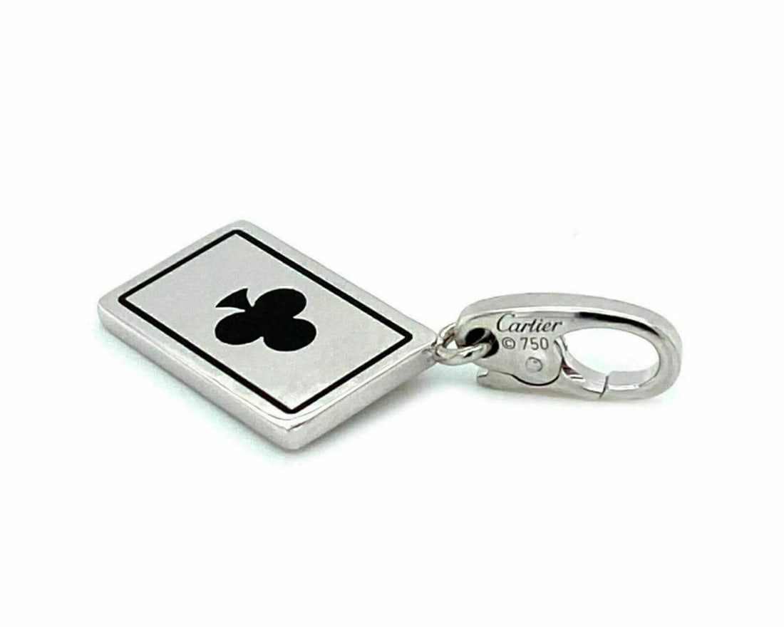 CARTIER PLAYING CARD CLUB 18K WHITE GOLD BLACK PENDANT: Cartier Playing Card Club 18k White Gold Black Pendant Brand: Cartier Type/Style: Pendant Material: 18k white gold with black enamel Color: white Size: Pendant Measurements: Approximately 1.14inch
