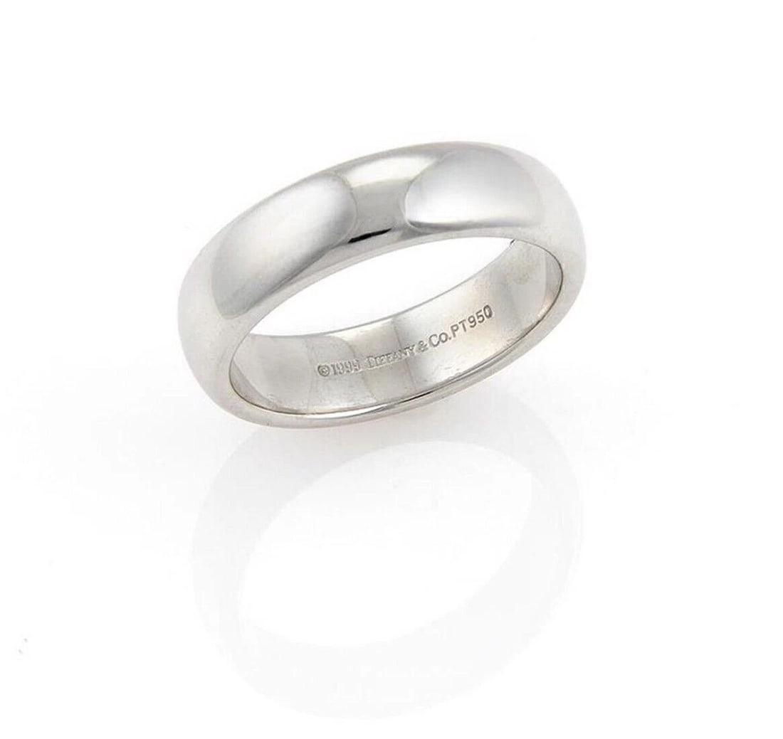 TIFFANY & CO. PLATINUM 950 BAND RING: Tiffany & Co. Platinum 950 Band Ring Brand: Tiffany & Co. Type/Style: Ring Material: PT950 Color: White Size: 9.5 US Accessories: None Accessories Notice: When purchasing pre-owned goods,