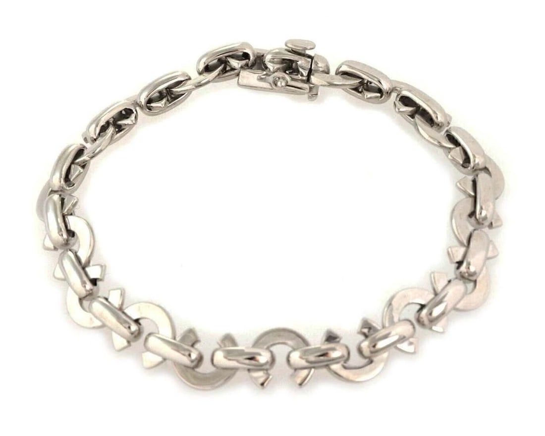 CHANEL 18K WHITE GOLD C LINK BRACELET: Chanel 18k White Gold C Link Bracelet Brand: CHANEL Type/Style: Bracelet Material: 18k white gold Color: white Size: Bracelet Length: Approximately 6.25inch Measurements: Approximately 6.25inch long x