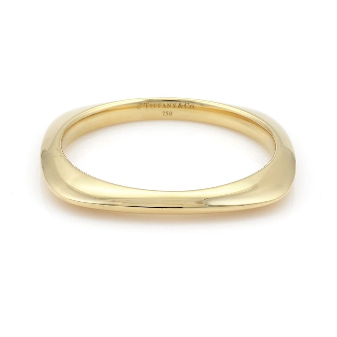 TIFFANY & CO. CUSHION SHAPE 18K YELLOW GOLD BANGLE BRACELET: Tiffany & Co. Cushion Shape 18k Yellow Gold Bangle Bracelet Brand: Tiffany & Co. Type/Style: Bracelet Material: 18k yellow gold Color: Yellow Size: Inner Circumference: Approximately 7.5inch Measureme