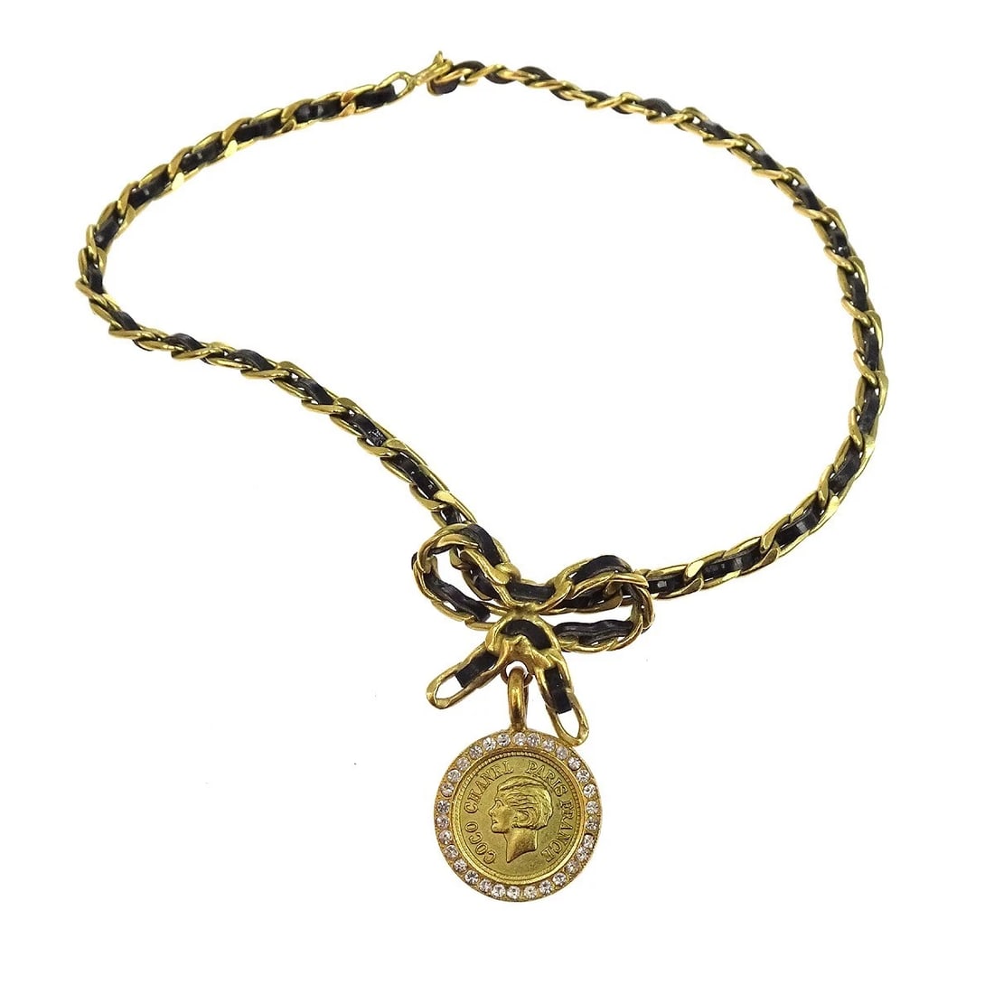 CHANEL GOLD BLACK BOW MEDALLION RHINESTONE CHOKER NECKLACE: Chanel Gold Black Bow Medallion Rhinestone Choker Necklace Brand: CHANEL Type/Style: Pendant Material: Patent Leather Gold Plated Main Stone Rhinestone Color: Gold, Black Size: Chain(Overall) : 36.0 c