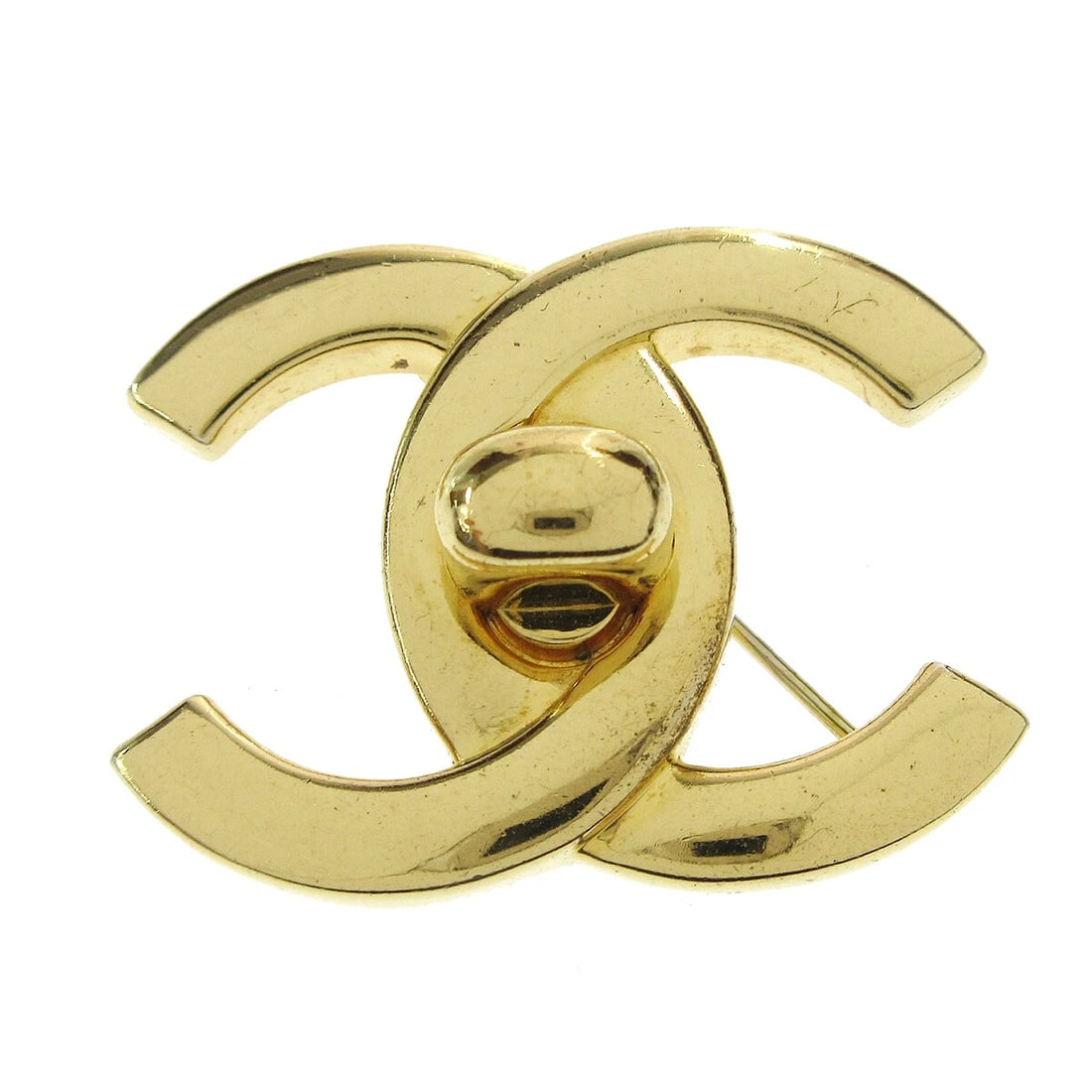CHANEL TURNLOCK BROOCH PIN GOLD LARGE: Chanel Turnlock Brooch Pin Gold Large Brand: CHANEL Type/Style: Brooch Material: Gold Plated Color: Gold Size: W 3.8 x H 2.8 cm Accessories: None Accessories Notice: When purchasing pre-ow