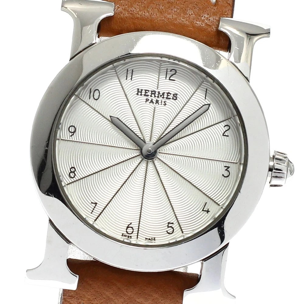 HERMES H WATCH RONDO SILVER DIAL QUARTZ WATCH: HERMES H watch Rondo Silver Dial Quartz Watch Brand: HERMES Type/Style: Wristwatch Material: Band Material leather, Case Material Stainless Steel Color: Band Color Brown, Case Color Silver, Dial