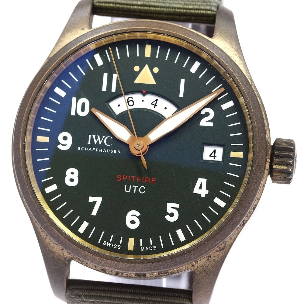 IWC SCHAFFHAUSEN UTC SPITFIRE WATCH: IWC SCHAFFHAUSEN UTC Spitfire Watch Brand: IWC SCHAFFHAUSEN Type/Style: Wristwatch Material: Band Material Nylon / leather, Case Material bronze Color: Band Color khaki, Case Color bronze, Dial Color