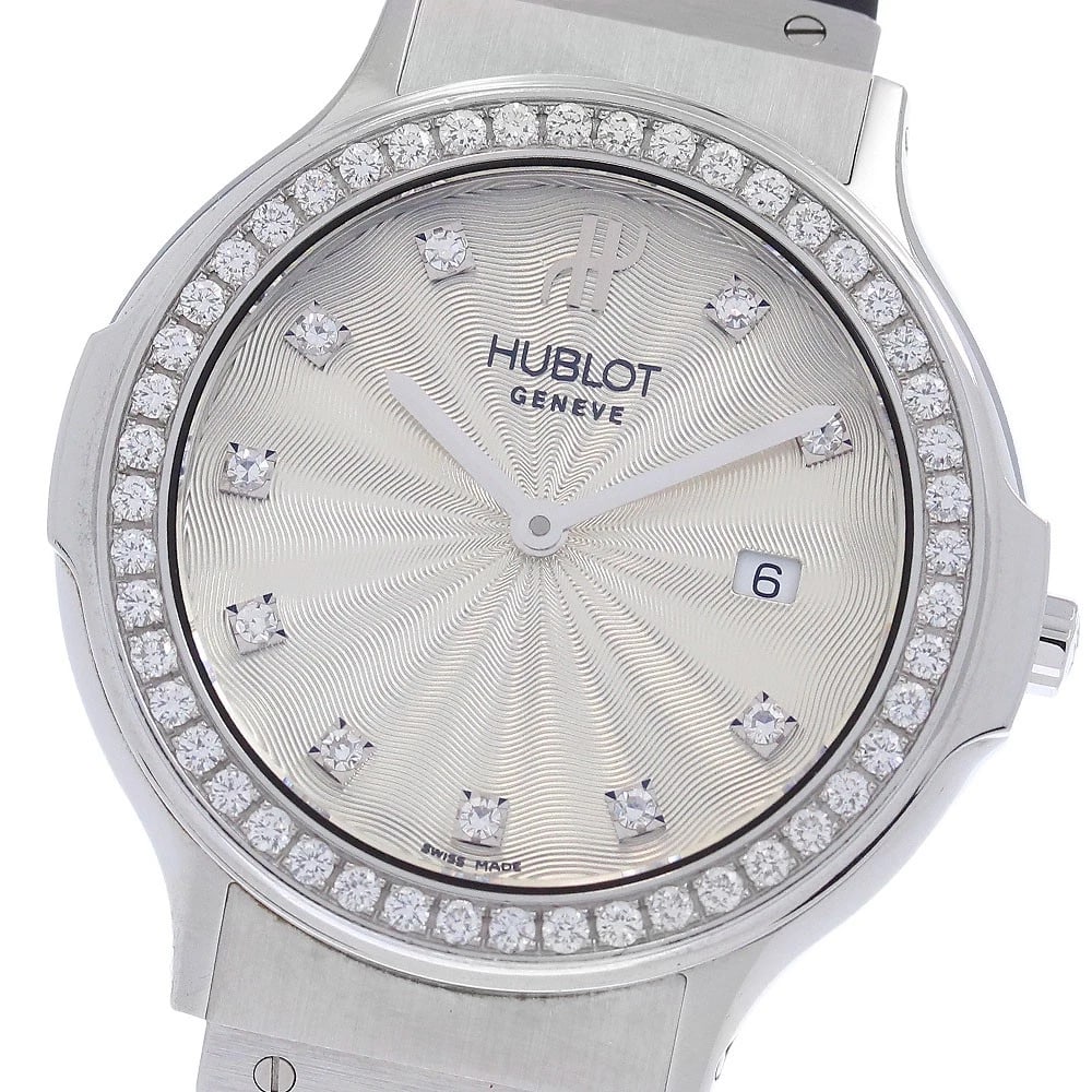 HUBLOT CLASSIC TRADITION DIAMOND BEZEL QUARTZ WATCH: HUBLOT Classic Tradition diamond bezel Quartz Watch Brand: HUBLOT Type/Style: Wristwatch Material: Band Material rubber, Case Material Stainless Steel Color: Band Color black, Case Color Silver, Dial 