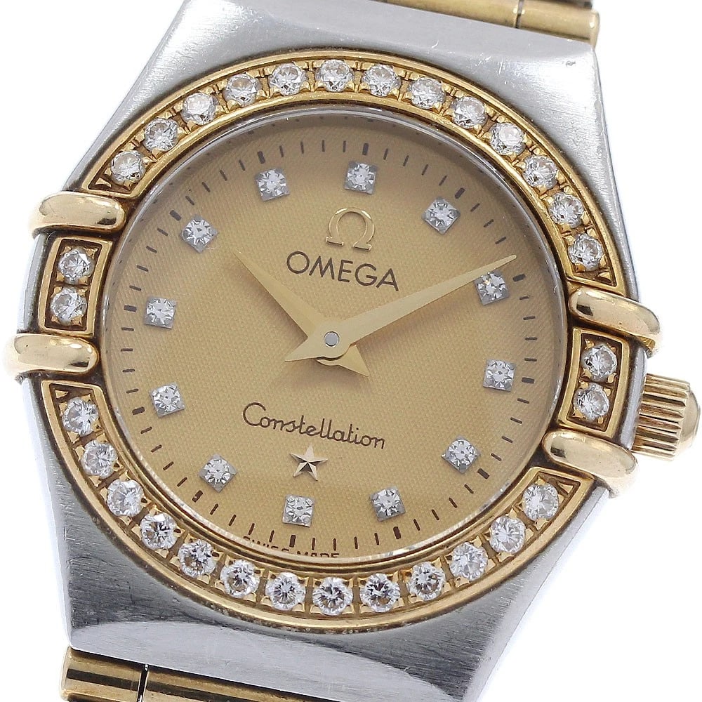 OMEGA CONSTELLATION DIAMOND BEZEL DIAMOND QUARTZ WATCH: OMEGA Constellation Diamond Bezel Diamond Quartz Watch Brand: OMEGA Type/Style: Wristwatch Material: Band Material Stainless Steel/YG, Case Material Stainless Steel/YG Color: Band Color Gold /
